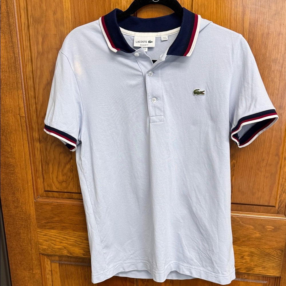 Lacoste men’s regular fit polo. Size Medium. Light blue with contrasting collar